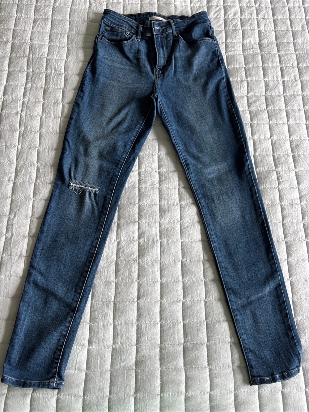 Levi's Women's Medium Blue Skinny Jeans with Knee Distress